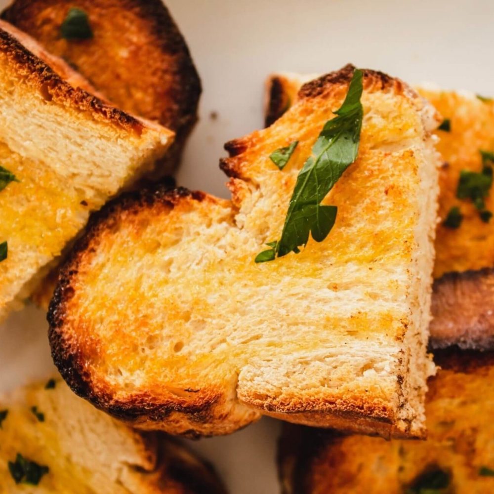 Toasted bread with olive oil and herbs,